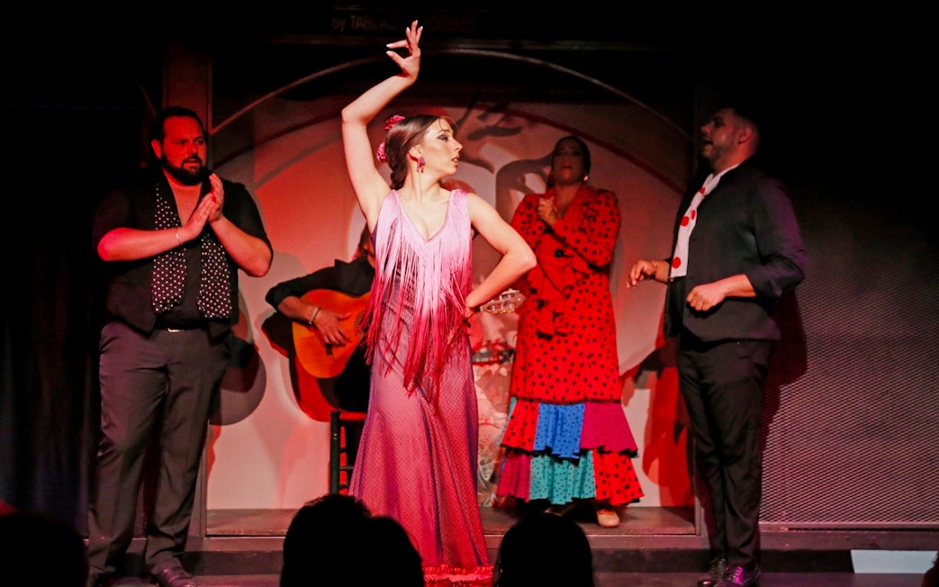 Flamenco dancers performing at El Duende by Tablao Cordobes show.