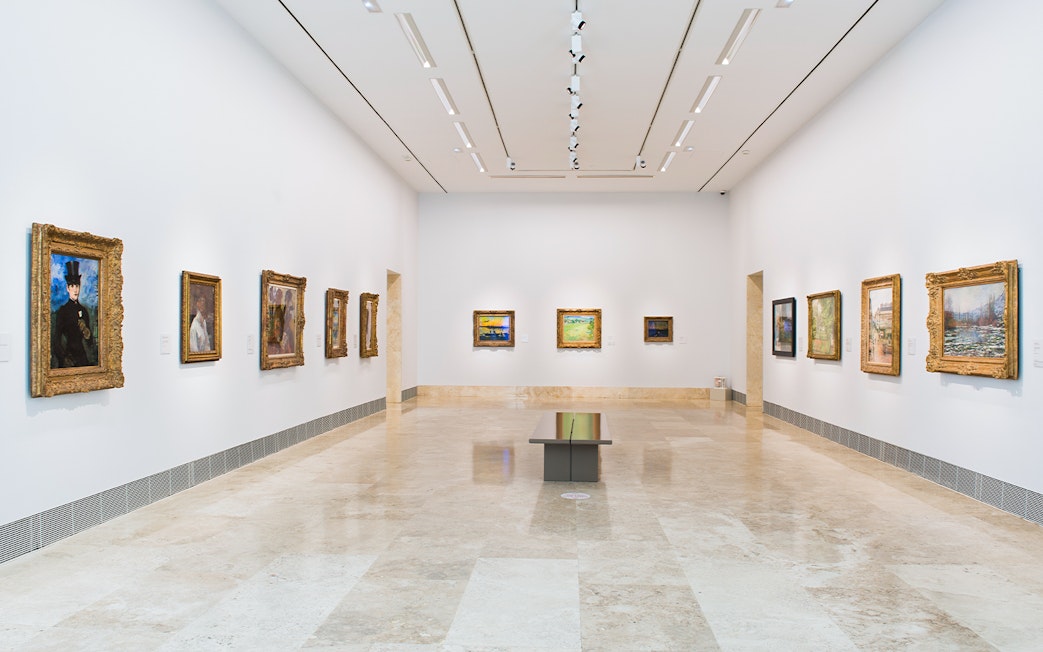 Thyssen Museum gallery with classic and modern paintings on display.