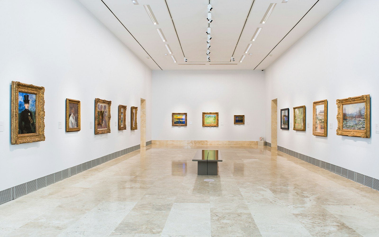 Thyssen Museum gallery with classic and modern paintings on display.
