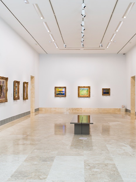 Thyssen Museum gallery with classic and modern paintings on display.