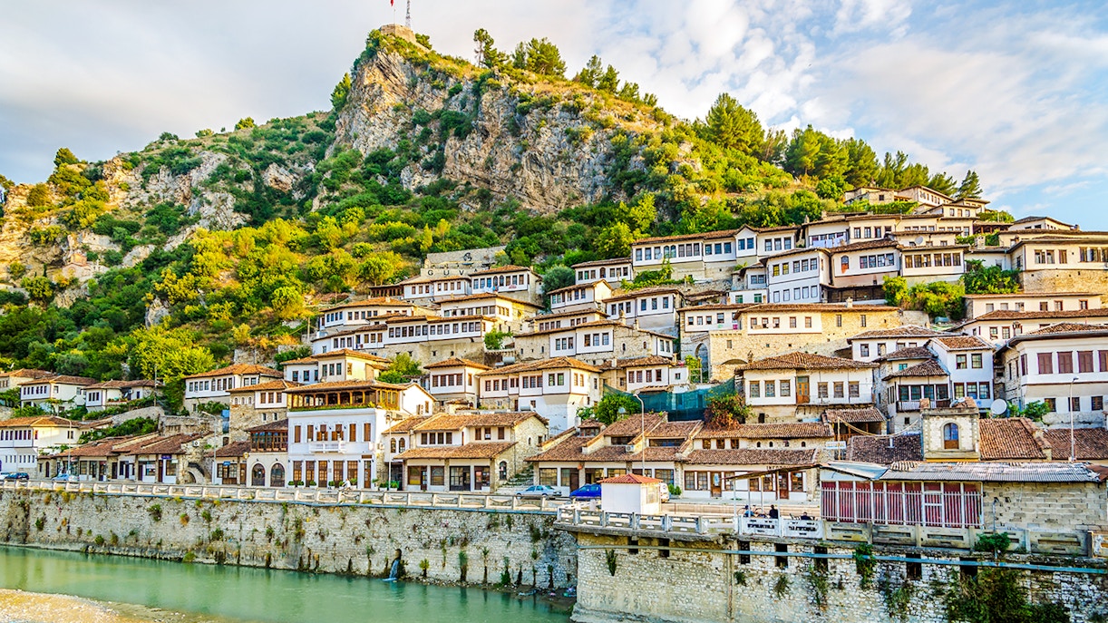 Old city of Berat with traditional white Ottoman houses on hillside.