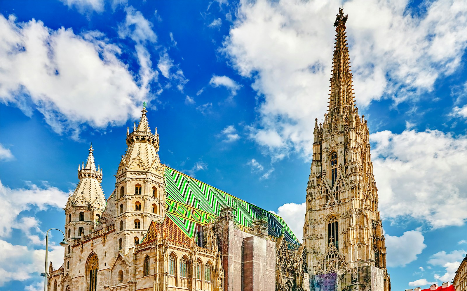 St. Stephen's Cathedral in Vienna with its colorful tiled roof and Gothic spire.