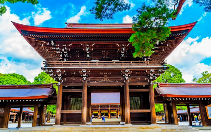 Hōzōmon Gate at Senso-ji Temple, Tokyo, with intricate wooden architecture.