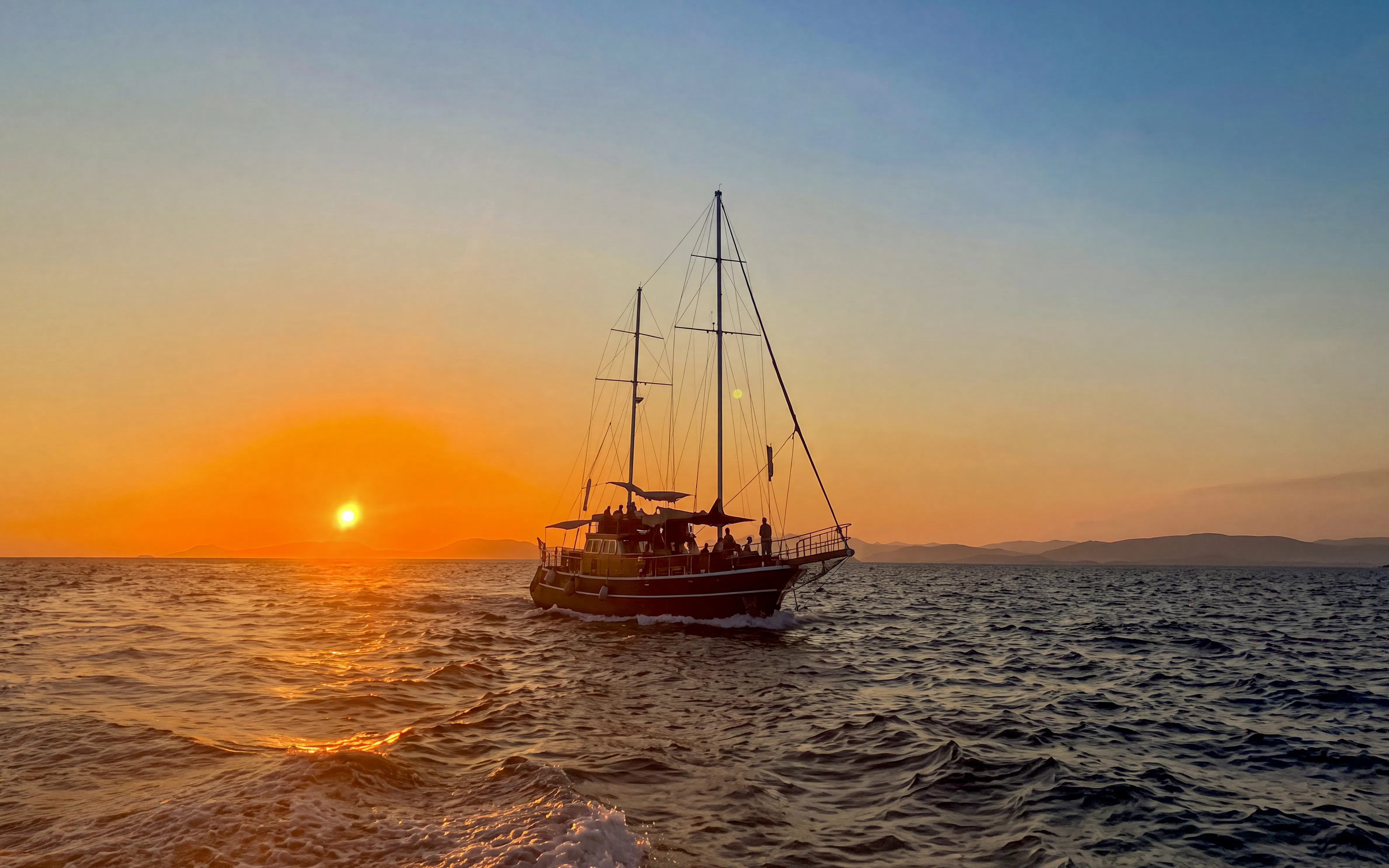Sunset cruise on Athens Riviera with sailboat, wine, and snacks.