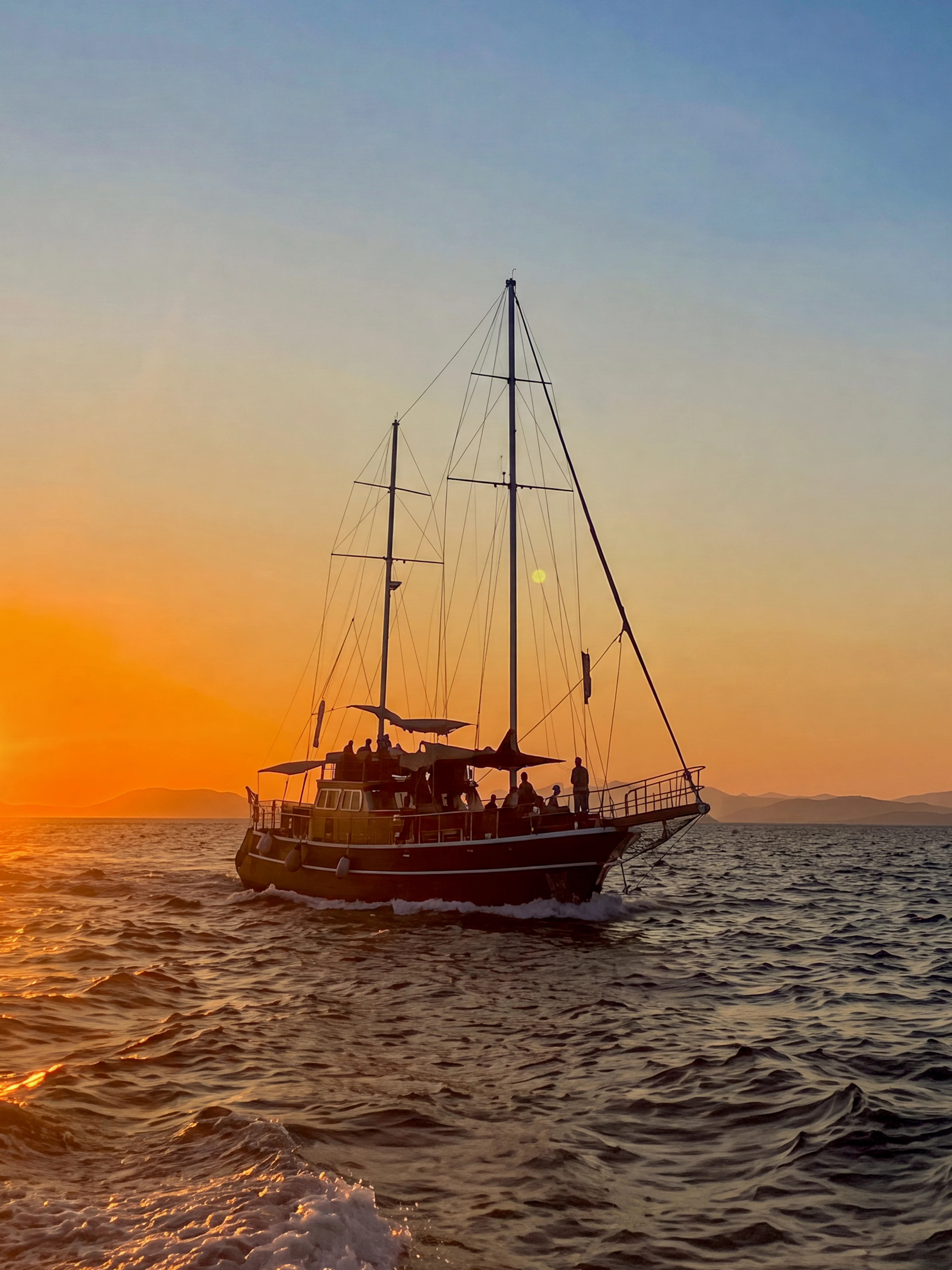 Sunset cruise on Athens Riviera with sailboat, wine, and snacks.