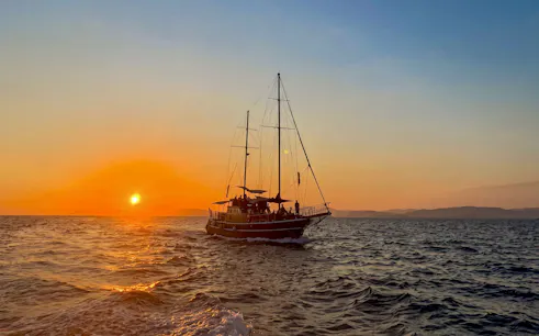 Sunset cruise on Athens Riviera with sailboat, wine, and snacks.
