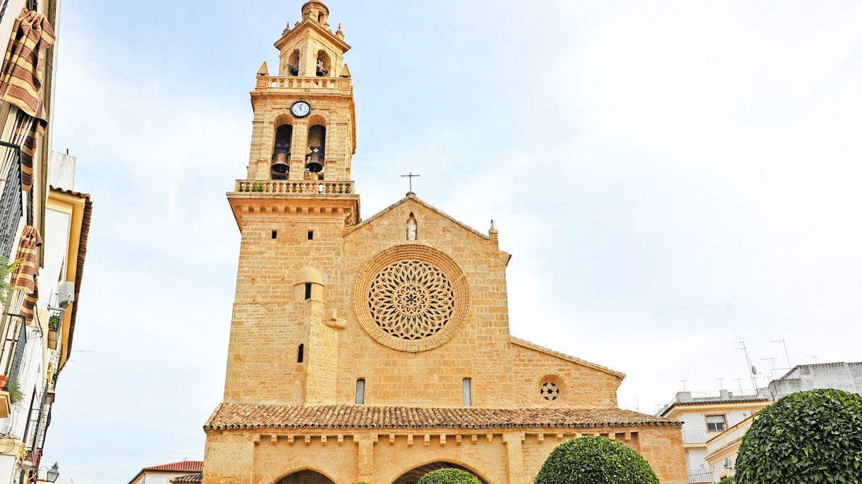 Church of San Lorenzo with bell tower and rose window in Cordoba, Andalusia, Spain.
