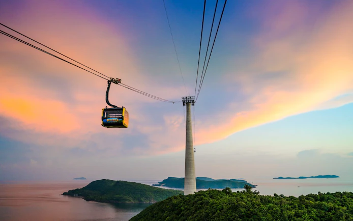 Hon Thom cable car over islands at sunset, Vietnam.