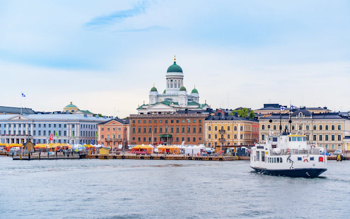 Ferry approaching South Harbour with Helsinki Cathedral in the background, Helsinki, Finland.
