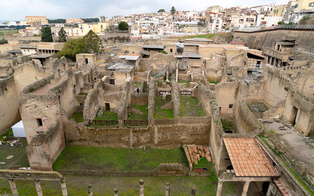 Ancient ruins of Herculaneum in Ercolano, near Naples, showcasing preserved stone structures.