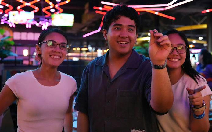 Guests playing darts at Loco Bear, Dubai.