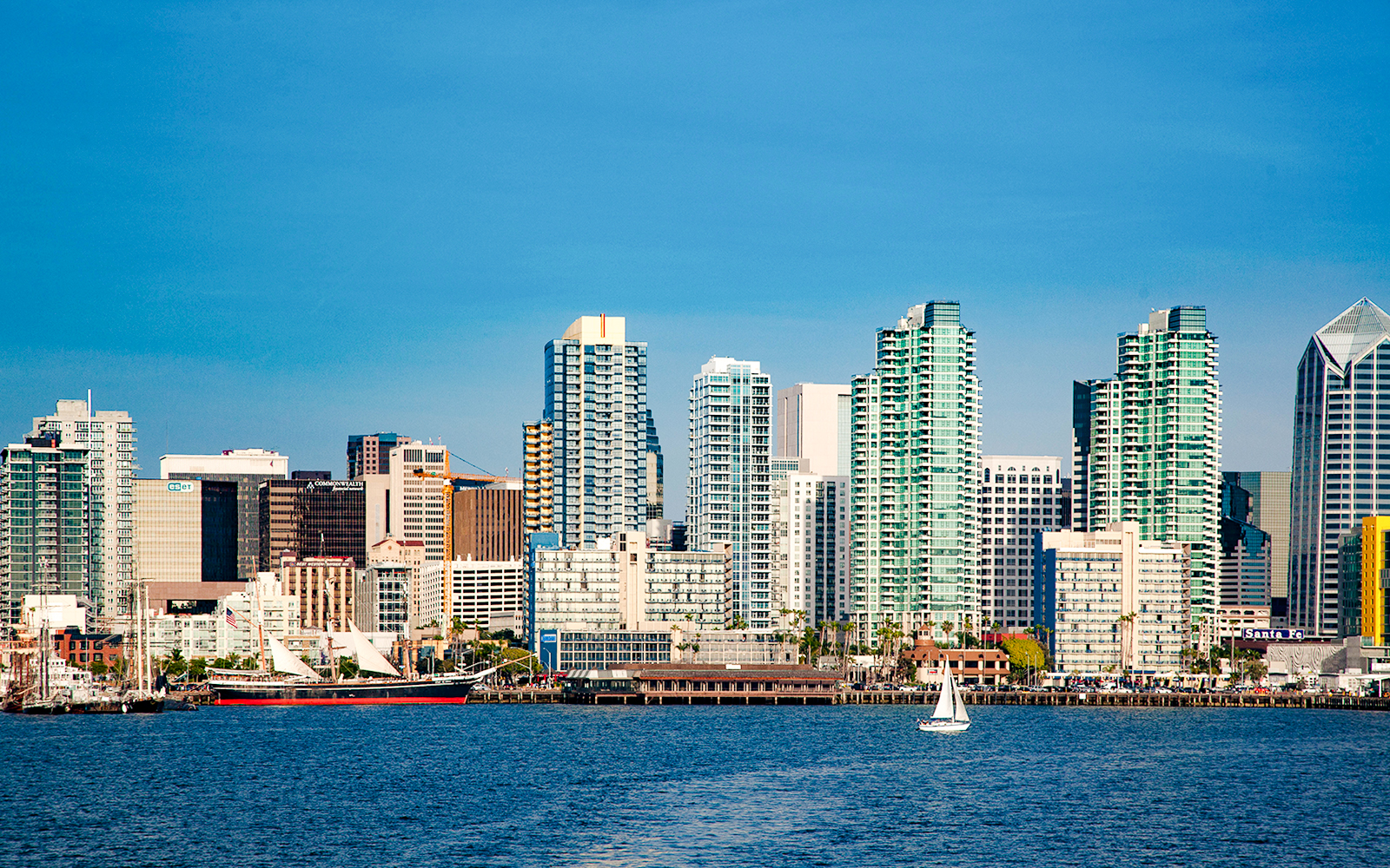 San Diego skyline with sailboats on the bay during Best of the Bay Harbor Tour.