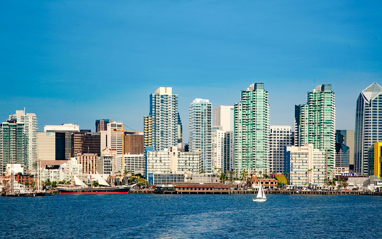 San Diego skyline with sailboats on the bay during Best of the Bay Harbor Tour.