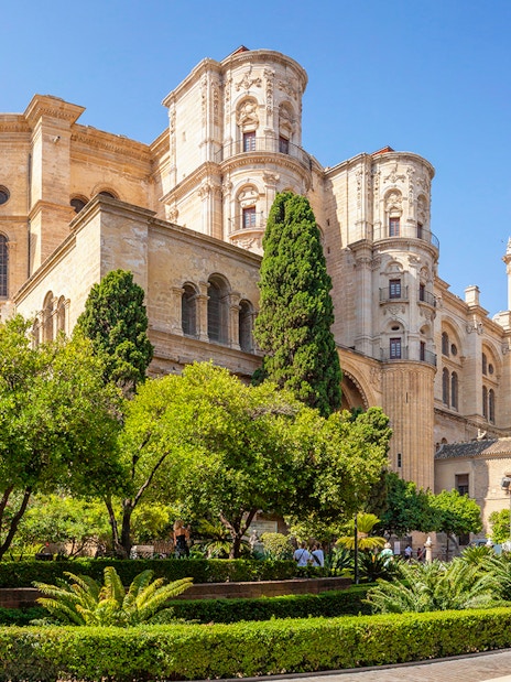Malaga Cathedral with gardens in Andalusia, Spain.