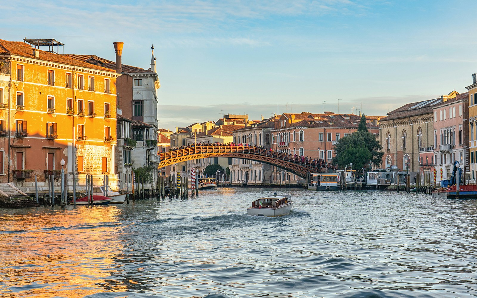 Grand Canal at sunset with Ponte dell'Accademia bridge in Venice.