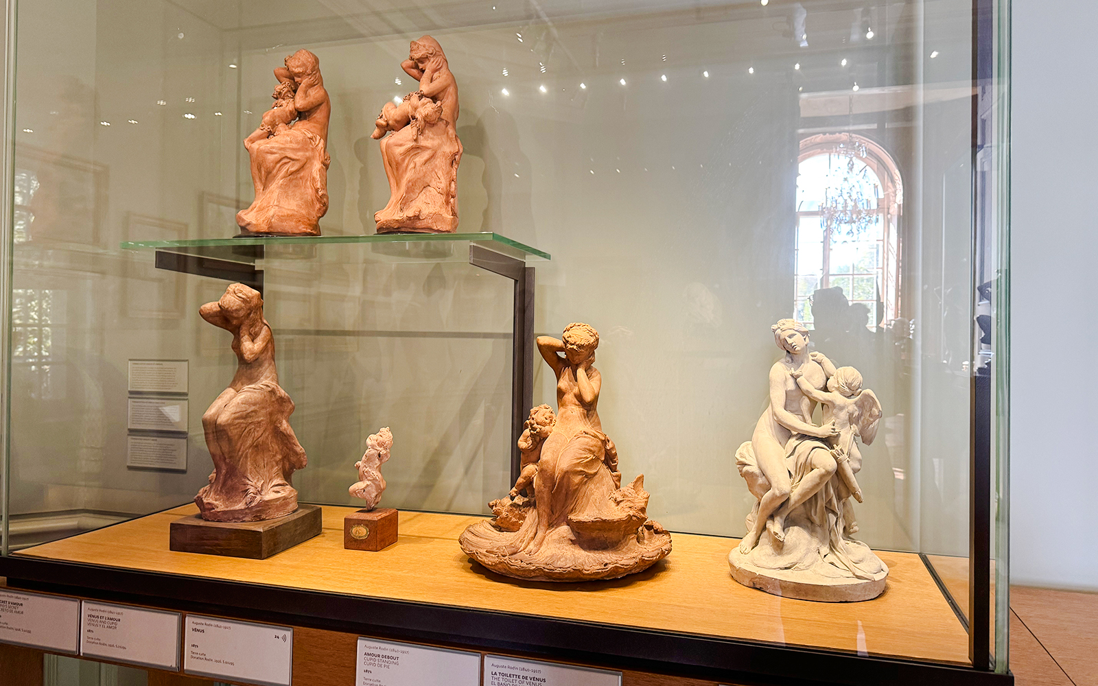 Sculptures in the Plaster Gallery at Rodin Museum, Paris, showcasing intricate figures.