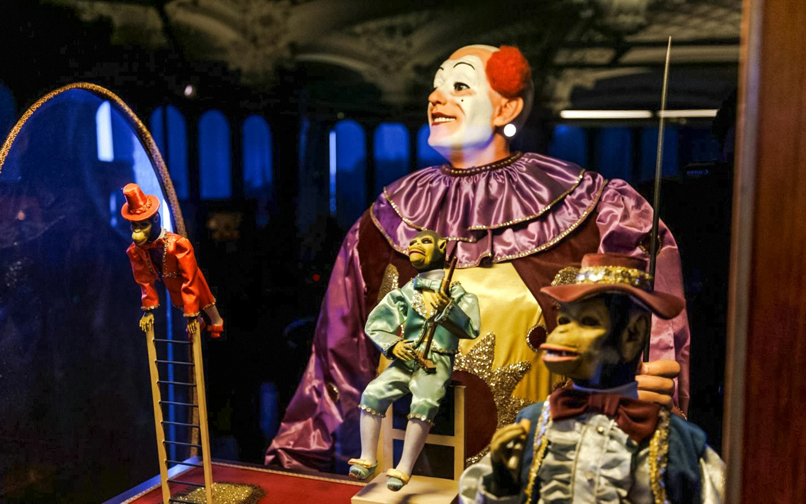 Automaton display with clown and monkey figures at Tibidabo Amusement Park museum.