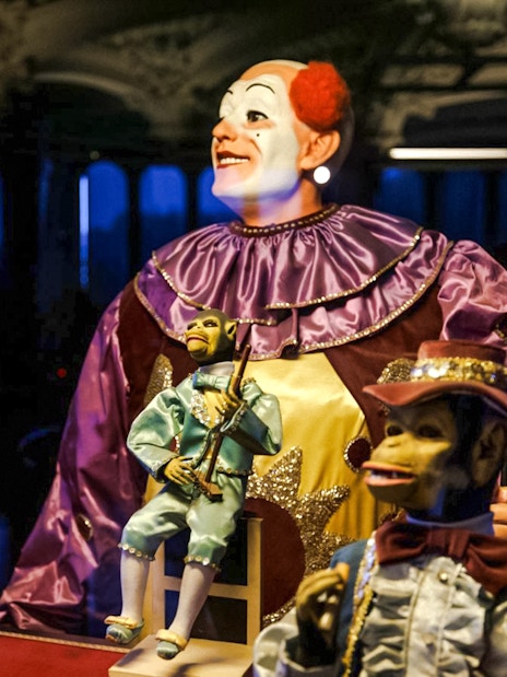 Automaton display with clown and monkey figures at Tibidabo Amusement Park museum.