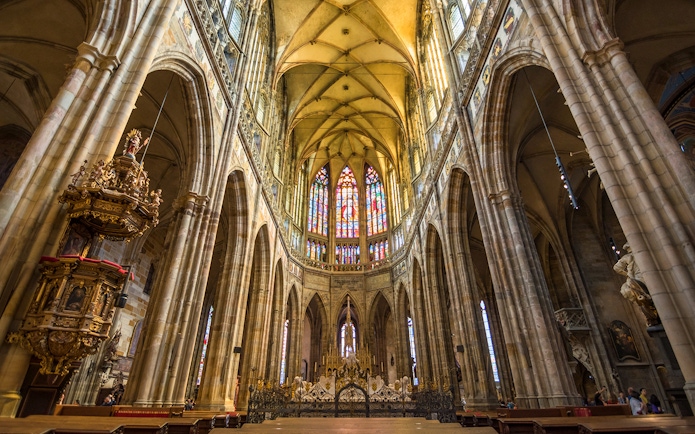 Stained glass windows and vaulted ceiling inside St Vitus Cathedral, Prague Castle.