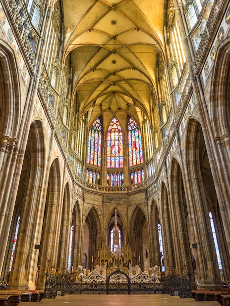 Stained glass windows and vaulted ceiling inside St Vitus Cathedral, Prague Castle.