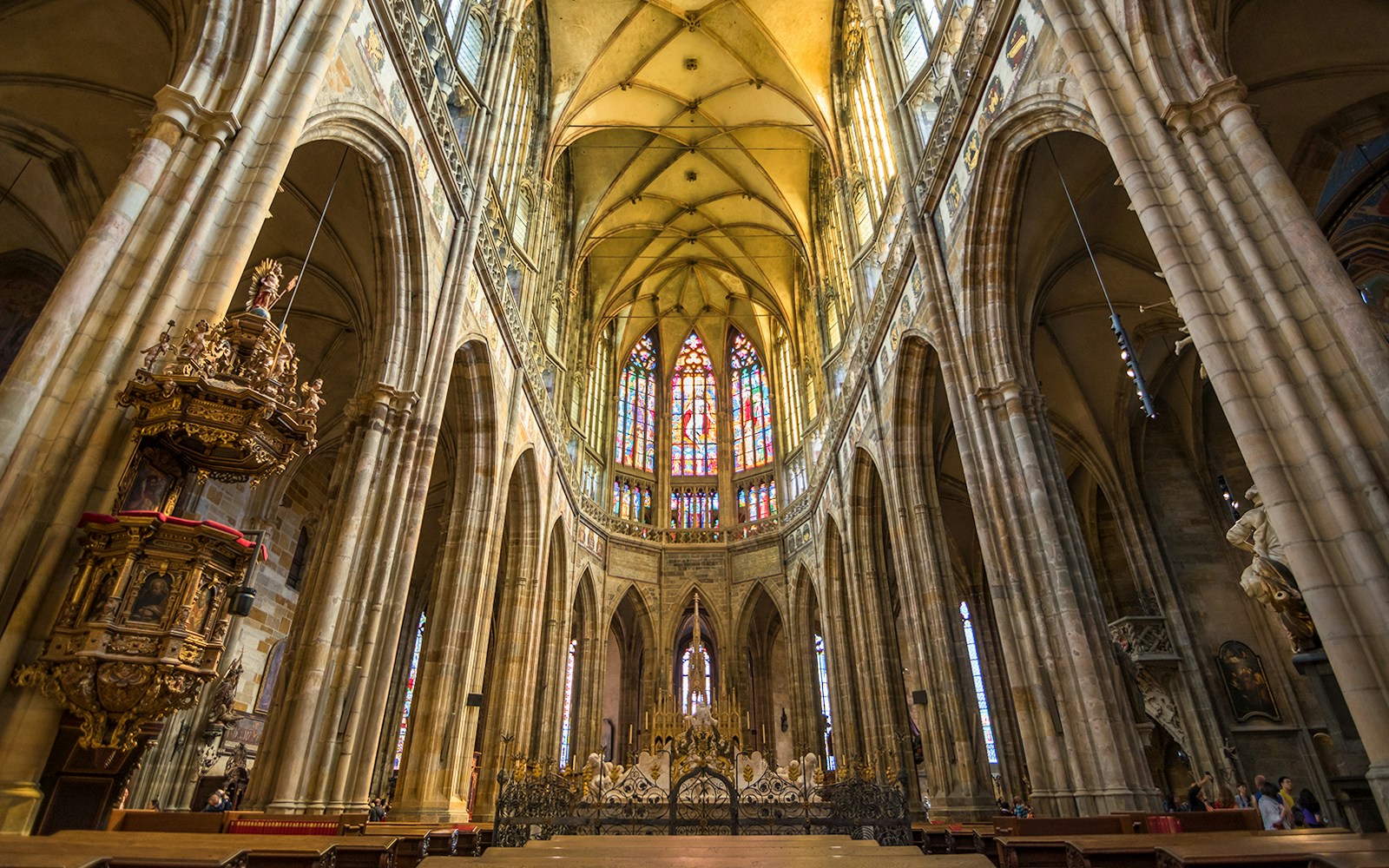 Stained glass windows inside St Vitus Cathedral during Prague Castle guided tour.