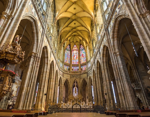 Stained glass windows and vaulted ceiling inside St Vitus Cathedral, Prague Castle.