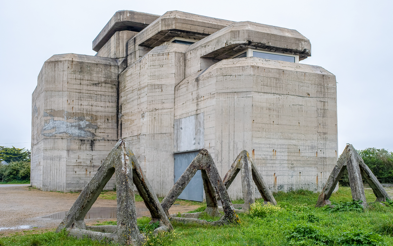 Normandy D-Day bunker with anti-tank obstacles, France.