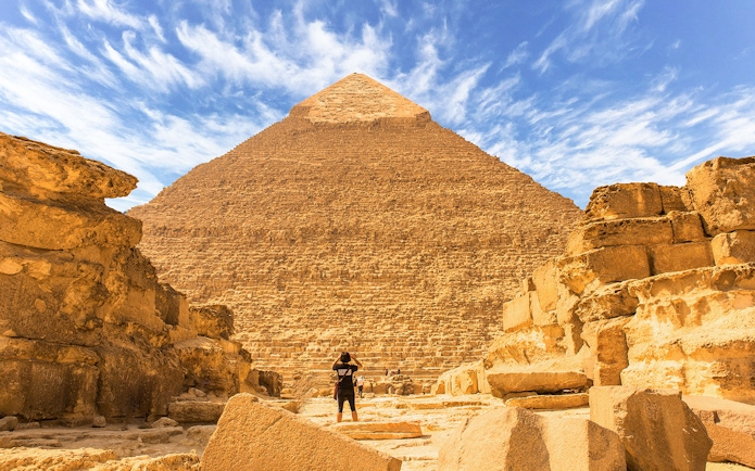 Man viewing the Great Pyramid of Giza in Egypt.