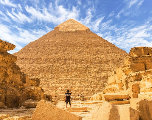Man viewing the Great Pyramid of Giza in Egypt.