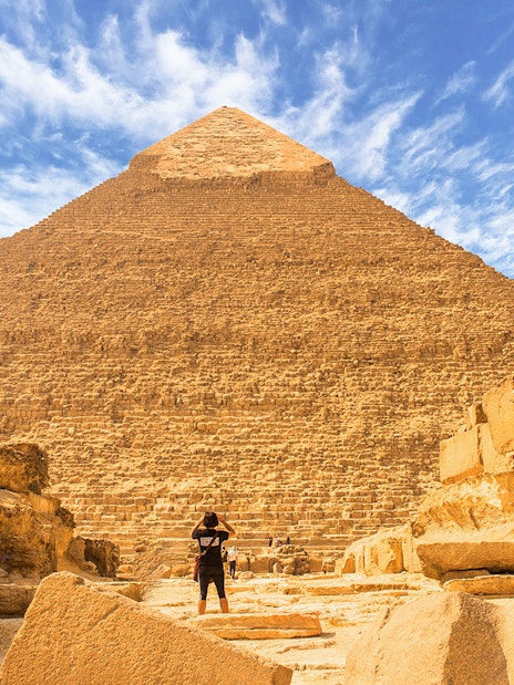 Man viewing the Great Pyramid of Giza in Egypt.