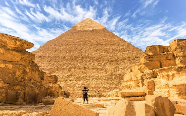 Man viewing the Great Pyramid of Giza in Egypt.