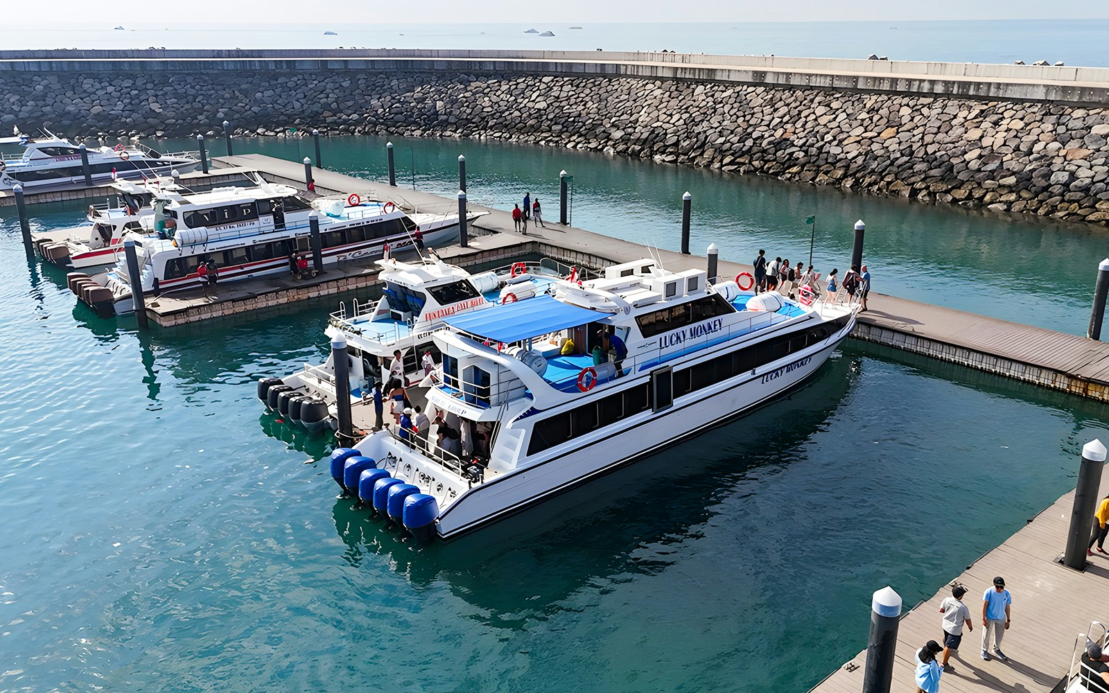 Fast boat transferring passengers from Sanur, Bali to Nusa Penida, showcasing the unique experience of sea travel in Indonesia