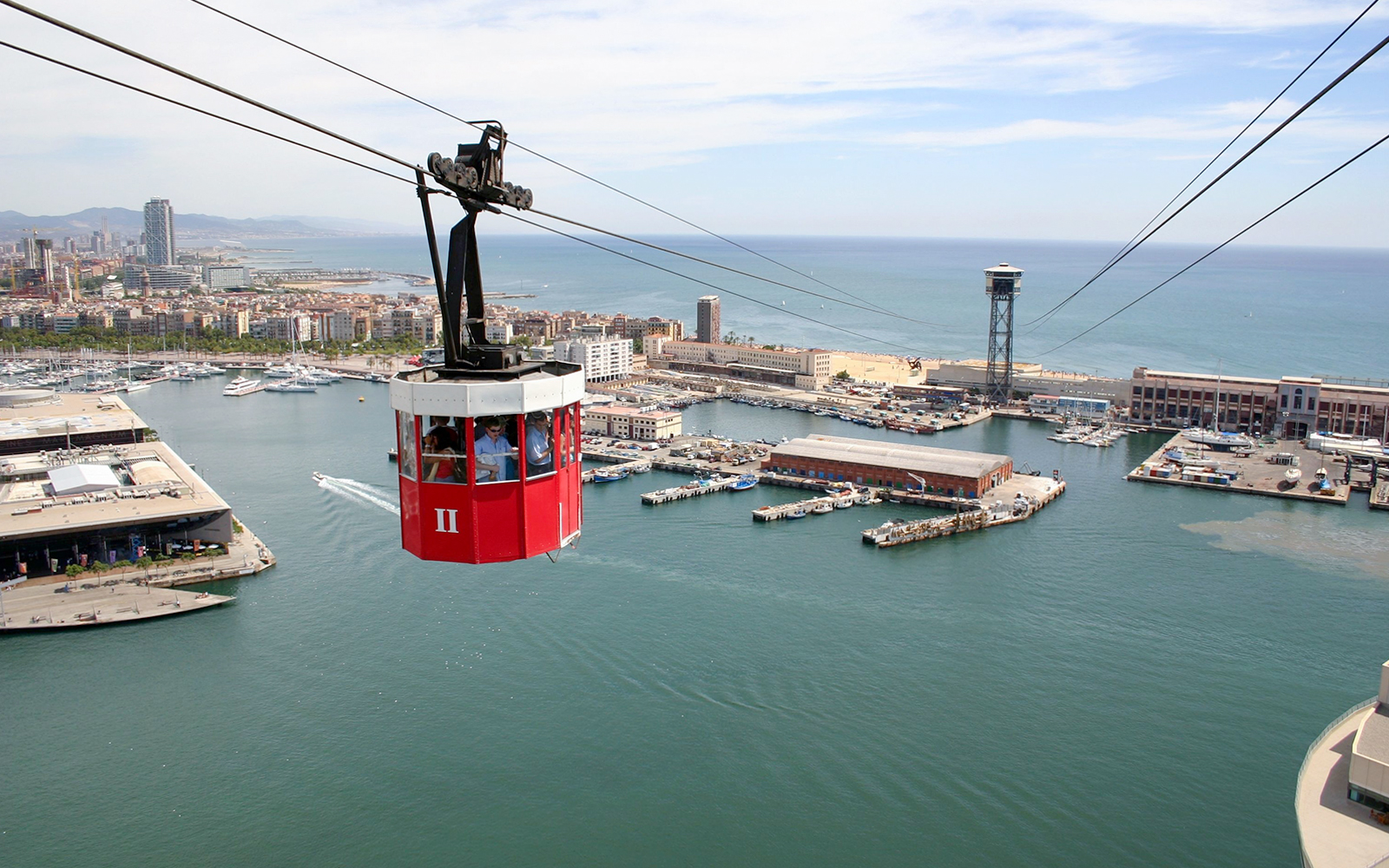 Tourists exploring Barcelona city attractions with the Turbopass Barcelona City Card, including public transport and over 25 landmarks