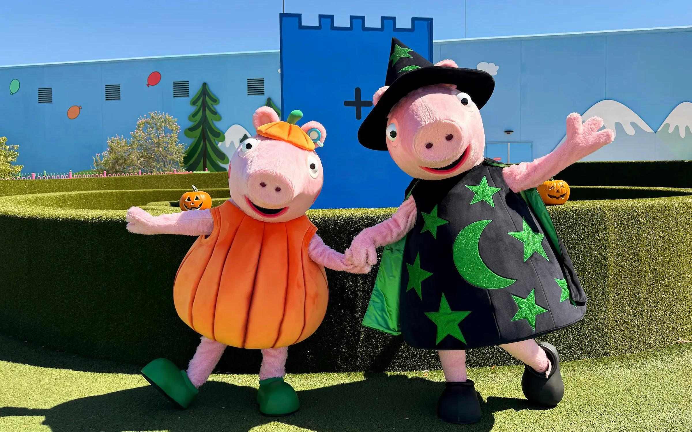 Peppa Pig characters in Halloween costumes at Peppa Pig Theme Park, Florida.