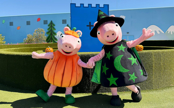 Peppa Pig characters in Halloween costumes at Peppa Pig Theme Park, Florida.