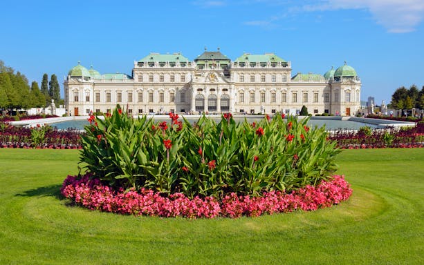 Upper Belvedere Palace in Vienna with gardens and fountain in foreground.
