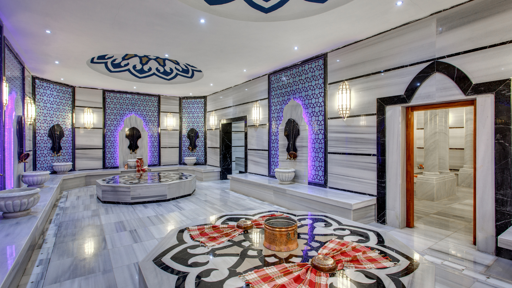 Turkish bath with marble walls in Bodrum showcasing traditional architecture.