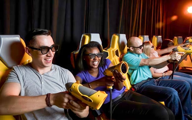 People enjoying a 3D gaming experience at Andretti Indoor Karting in Orlando.