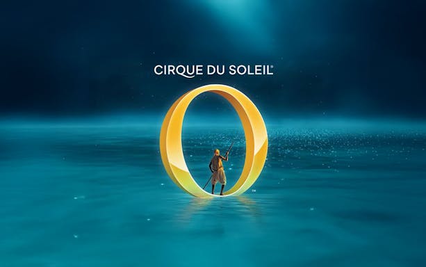 Performer standing in a large "O" on water, Cirque du Soleil Las Vegas show.