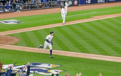 Baseball player running bases during New York Yankees vs Detroit Tigers game, September 6, 2023.