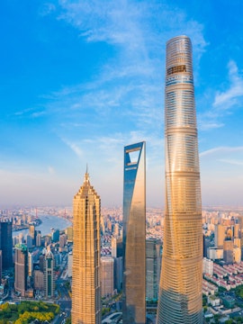 Shanghai skyline with Jin Mao Tower, Shanghai World Financial Center, and Shanghai Tower.