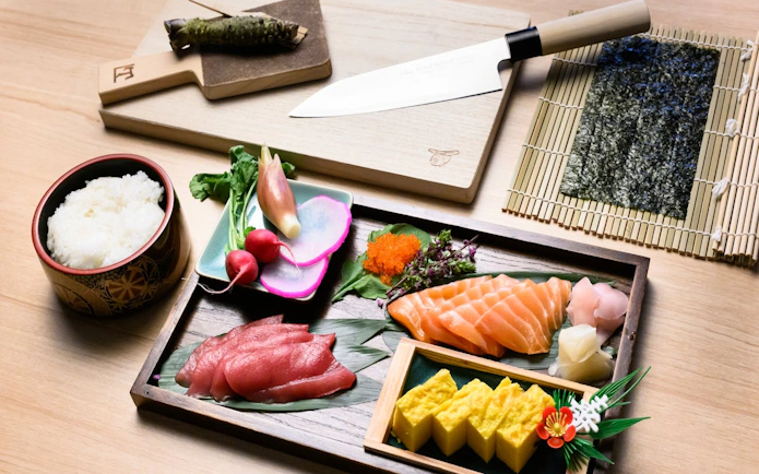 Sushi ingredients with tuna, salmon, rice, and vegetables for Tsukiji Market tour.