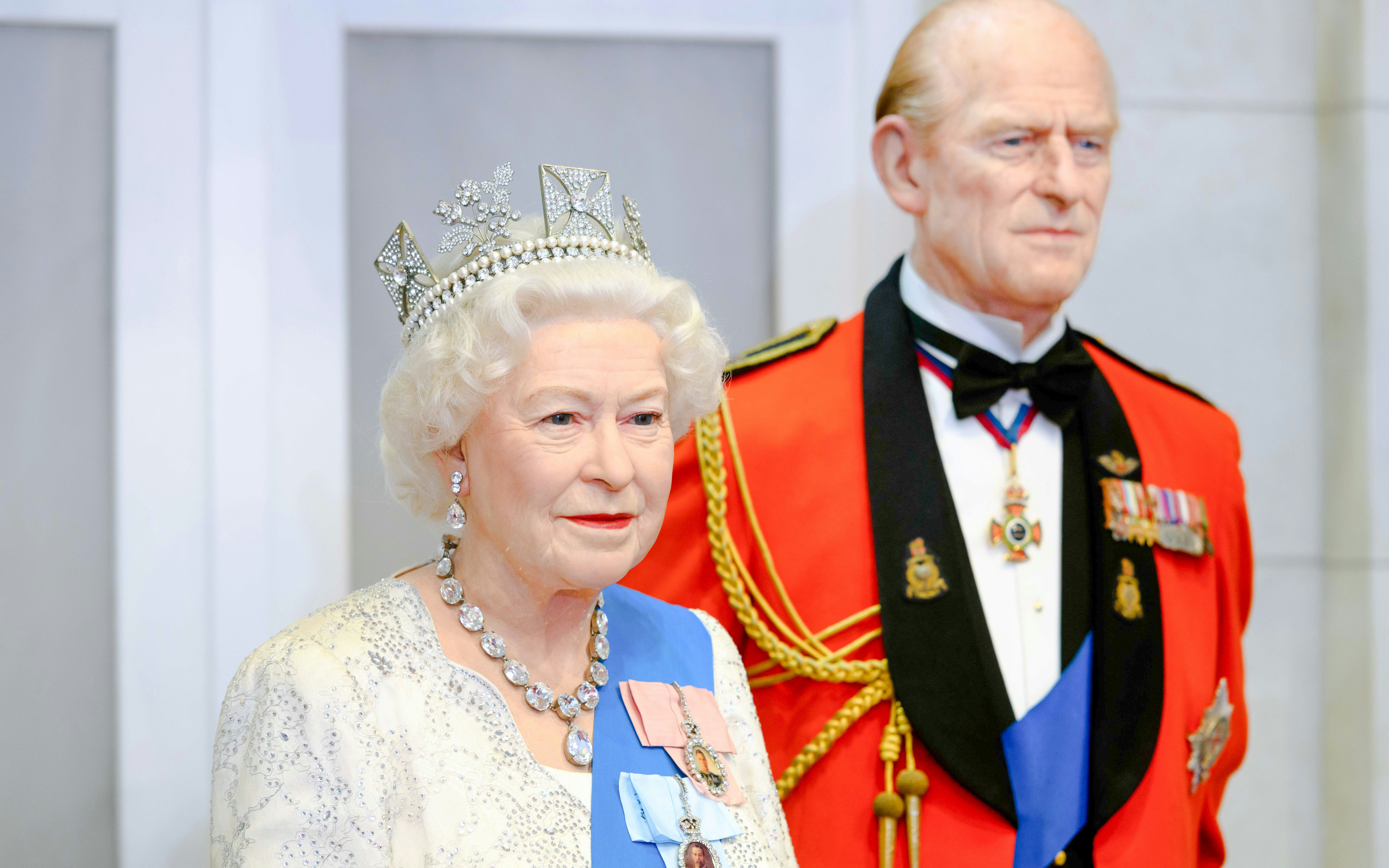 Wax figures of Queen Elizabeth II and Prince Philip at Madame Tussauds London.