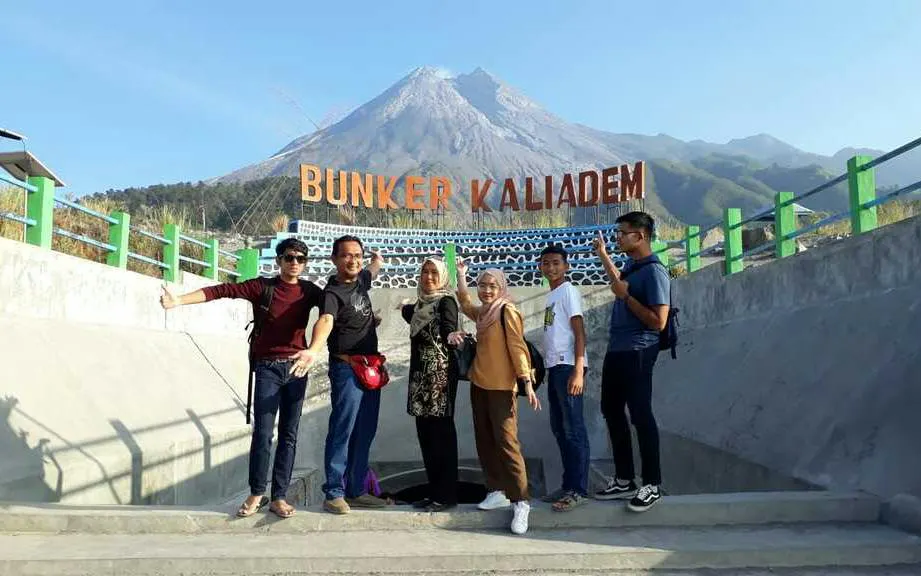 Group at Bunker Kaliadem with Mount Merapi in background, Jeep Merapi Lava Tour, Dubai.