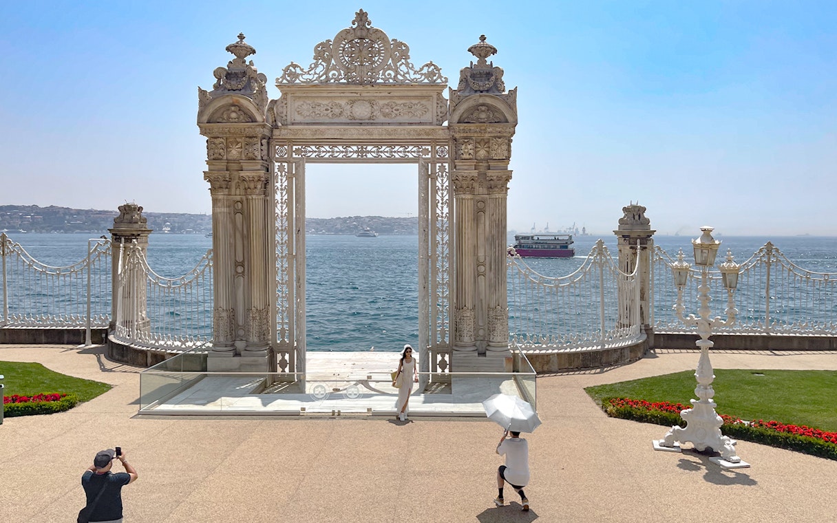 Imperial gate of Dolmabahce Palace overlooking the Bosphorus, Istanbul, Turkey.