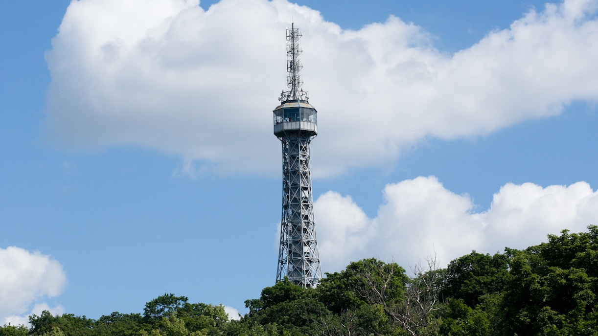 Petrin Lookout Tower in Prague with cityscape view.