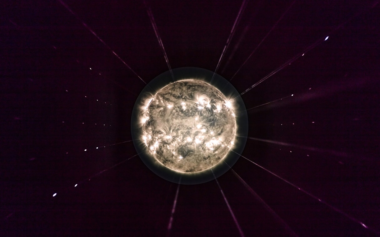 Illuminated sphere exhibit at Light Art Museum.