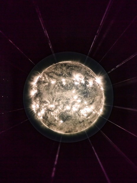 Illuminated sphere exhibit at Light Art Museum.