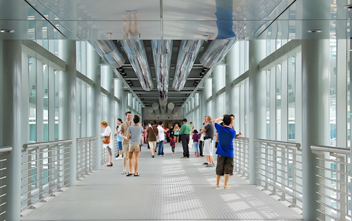Visitors exploring the Skybridge of Petronas Twin Towers in Kuala Lumpur.