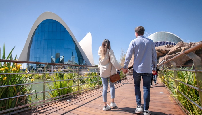 Oceanogràfic Valencia entrance with unique architecture and surrounding pond.